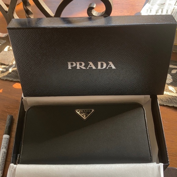 Prada Handbags - NIB Prada nylon and leather wallet